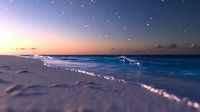 Tranquil beach scene at twilight with gentle waves rolling onto sandy shore under starry sky, featuring dreamy purple and orange sunset colors reflecting on ocean surface.