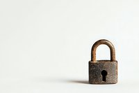 Rustic antique padlock with keyhole against white background, showing aged metal texture and patina. Minimalist composition with copy space.