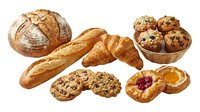 Assorted fresh baked goods including artisan bread, croissants, cookies and pastries isolated on white background for bakery, cafe and food service design projects.