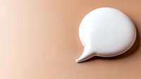 White speech bubble on beige background, minimalist communication concept for social media, messaging apps and digital dialogue design layouts.