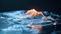 Glowing orange mountain peak emerging from rippling blue water surface with abstract wave patterns and light reflections creating surreal landscape effect.