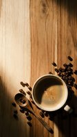 Fresh brewed coffee cup with roasted beans and wooden spoon on rustic wood table background for cafe menu design and morning beverage advertising.