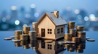 Wooden house model surrounded by stacks of golden coins on reflective surface with blurred city lights background for real estate investment concept.