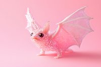 Cute pink glittery dragon with white horns and wings on isolated pink background, perfect for children's designs, nursery decor, and fantasy-themed projects.
