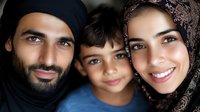 Happy Middle Eastern family portrait showing parents in traditional hijab with young child smiling at camera against dark background. Genuine emotions and connection.