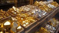 Luxury jewelry store display with golden and silver precious metals, gems, and minerals arranged in wooden compartments, showcasing valuable collection.