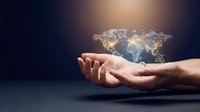 Human hands holding glowing digital world map with network connections representing global business technology and international communication.