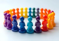 Colorful game pieces arranged in circle formation on white background showing unity, teamwork and diversity concept. Isolated pawns ready for design use.