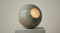 Cracked spherical sculpture with glowing golden core on stone pedestal, symbolizing energy release and transformation for art, design, and conceptual projects.