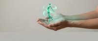 Hands holding glowing green dollar sign symbol representing financial growth, investment success, money management and economic prosperity concept.