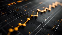 Orange glowing line graph showing financial market data on dark background with selective focus, depicting business growth and stock analysis.