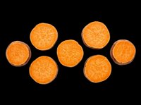 Sliced carrot rounds isolated on transparent background, ready for culinary designs, recipe graphics, food packaging, t-shirt prints, stickers, and print-on-demand products.
