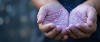 Hands holding glowing digital network connections and data visualization, representing technology innovation, artificial intelligence, and digital transformation for business solutions.