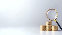 Magnifying glass examining stacks of gold coins on light background, financial analysis and investment research concept for business growth.