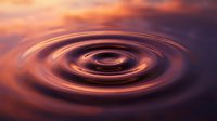 Cosmic swirl with vibrant orange and purple hues creating mesmerizing ripple effect against dramatic sky background for abstract design projects.