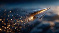 Glowing paper airplane with golden sparks flying through twilight sky with bokeh lights and particle trail effects for creative projects.