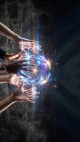 Multiple hands reaching toward glowing magical energy sphere with sparks and light effects for fantasy and supernatural concepts.