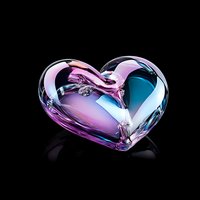 Glossy crystal heart with pink and blue iridescent reflections on black background, elegant romantic symbol with glass-like texture and smooth curves.