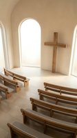 Serene chapel interior with wooden pews facing large cross and arched window flooding space with natural light for worship and spiritual gatherings.