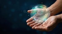 Male hands holding glowing digital sphere with futuristic interface elements and holographic data visualization for technology and innovation concepts.