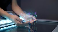 Close-up of hands holding glowing holographic globe with connected network lines, representing global communication, digital connectivity, and technology innovation for business solutions.