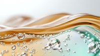 Luxurious flowing waves of gold and turquoise liquids with crystal clear bubbles and droplets creating dynamic abstract composition against light background.