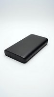 Black leather wallet isolated on white background, closed rectangular design with rounded edges, suitable for product mockups, e-commerce, and retail presentations.