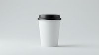 White disposable coffee cup with black lid isolated on gray background for branding mockup and cafe marketing materials.