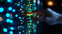 Glowing particles forming a spiral DNA helix structure with blue and green bokeh lights against dark background, scientific molecular visualization.