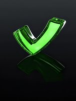 Transparent green glass checkmark symbol on black background with reflection, representing approval, success, or confirmation.
