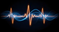 Glowing orange and blue sound wave visualization with pulse rhythm on dark background for audio technology and music production projects.