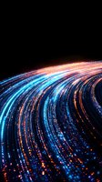 Curved light trails in blue and orange colors creating dynamic motion effect against black background, glowing particles and streaks for technology concept.