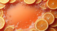 Fresh orange slices arranged in frame border with water splashes and drops on vibrant coral background, copy space for text in center area.