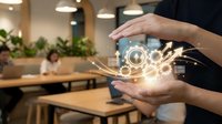 Person holding glowing digital network interface with interconnected nodes and light effects in modern office workspace with colleagues in background.