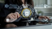 Professional businessman working on laptop with artificial intelligence technology overlay showing machine learning automation and data processing concepts.