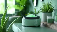 Green skincare cream jar with textured lid surrounded by aloe vera plants on wooden surface. Natural organic cosmetics for moisturizing and anti-aging.
