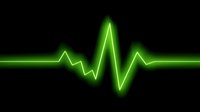 Glowing green heartbeat pulse line on black background, representing health monitoring, cardiac rhythm, or medical technology.