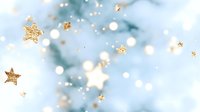 Magical golden glitter stars and bokeh lights floating on soft blue background, creating dreamy festive atmosphere for holiday designs and celebrations.