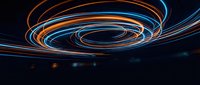 Abstract spiral light trails in orange and blue creating dynamic motion blur effect against dark background for modern digital design projects.