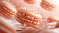 Pink macarons splashing into water with droplets and ripples creating dynamic motion for food photography and culinary advertising campaigns.