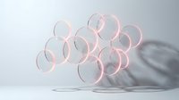 Transparent glass circles stacked in abstract formation casting soft shadows on white surface, suitable for modern design, backgrounds, and contemporary art projects.