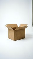 Open brown cardboard shipping box isolated on white background for packaging, delivery, moving and storage concepts.