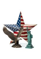 Patriotic composition featuring an eagle statue, liberty monument, and star with American flag pattern on white background, isolated for design use.
