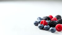 Fresh mixed berries blueberries raspberries blackberries on white background healthy organic fruit antioxidant superfood nutrition diet wellness.