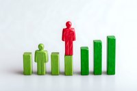 Red figure standing out on rising green bar graph, symbolizing leadership, success and growth concept on white background. Isolated business metaphor.