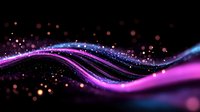 Glowing purple and blue waves with sparkling particles flow against dark background creating magical light effect. Suitable for abstract backgrounds.