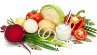 Fresh organic vegetables and dairy products arranged on white background for healthy cooking and nutrition concepts.