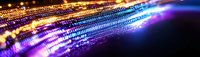 Digital binary code stream with glowing blue and orange light effects flowing through dark space, representing data transmission and network connectivity.