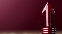 Glossy red arrow pointing upward on spiral base against dark burgundy background symbolizes growth, success and forward momentum in business and finance.