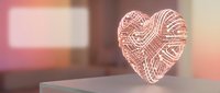 Pink woven rattan heart decoration on wooden surface with soft bokeh background for romantic home decor and craft projects.